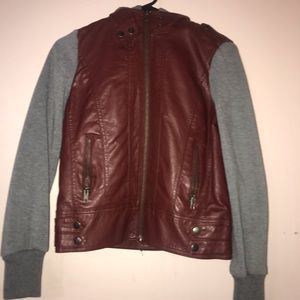Maroon Leather jacket, with grey sleeves.